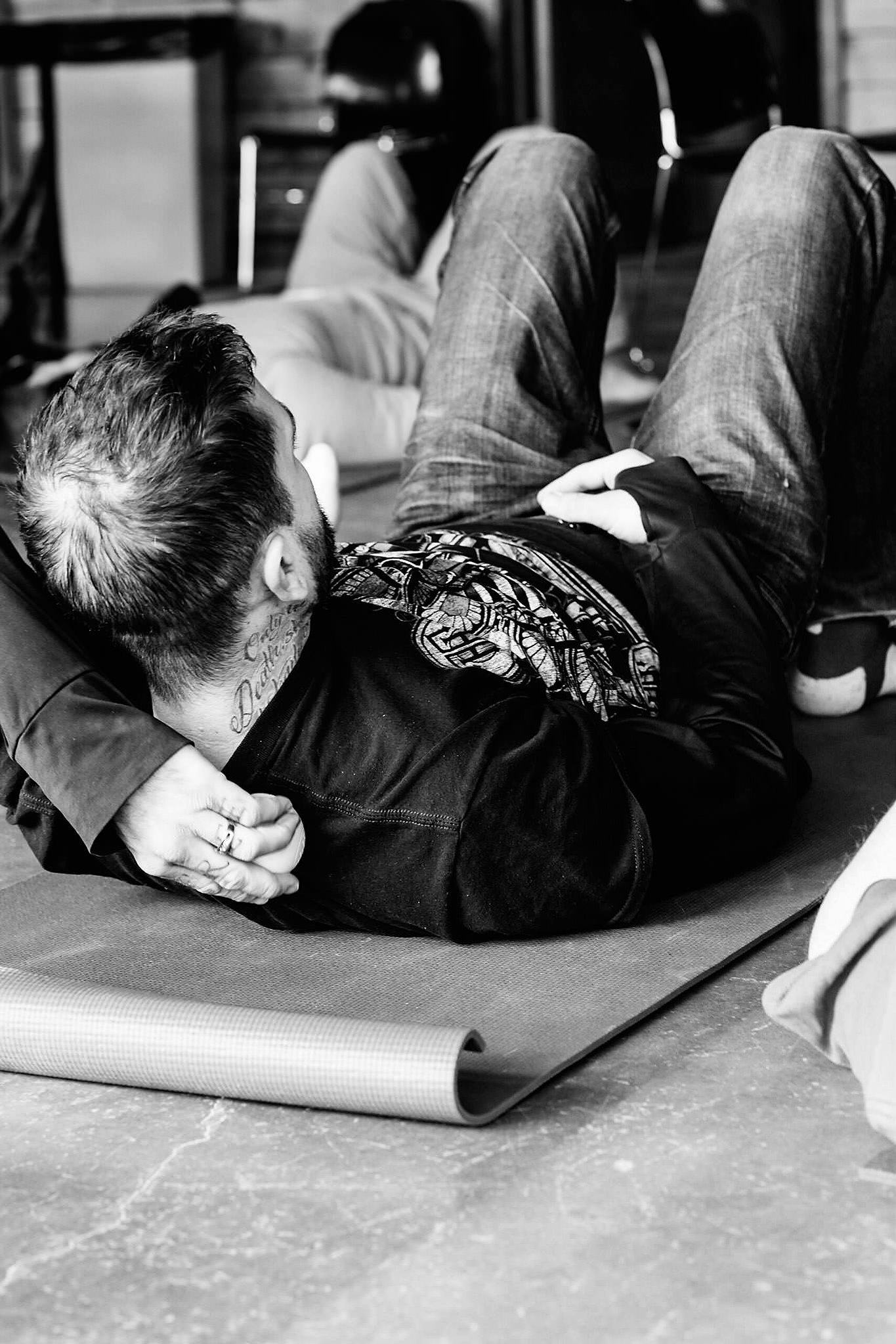Nick S., an Iraq Veteran, uses the lacrosse ball to massage trigger points in the shoulder and back to relieve stress and create balance.