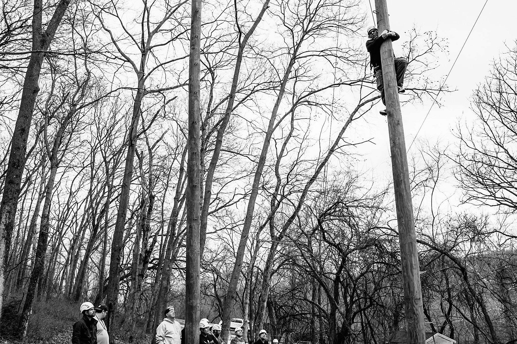 At the top he shouts to the others what he is giving up and moving toward.