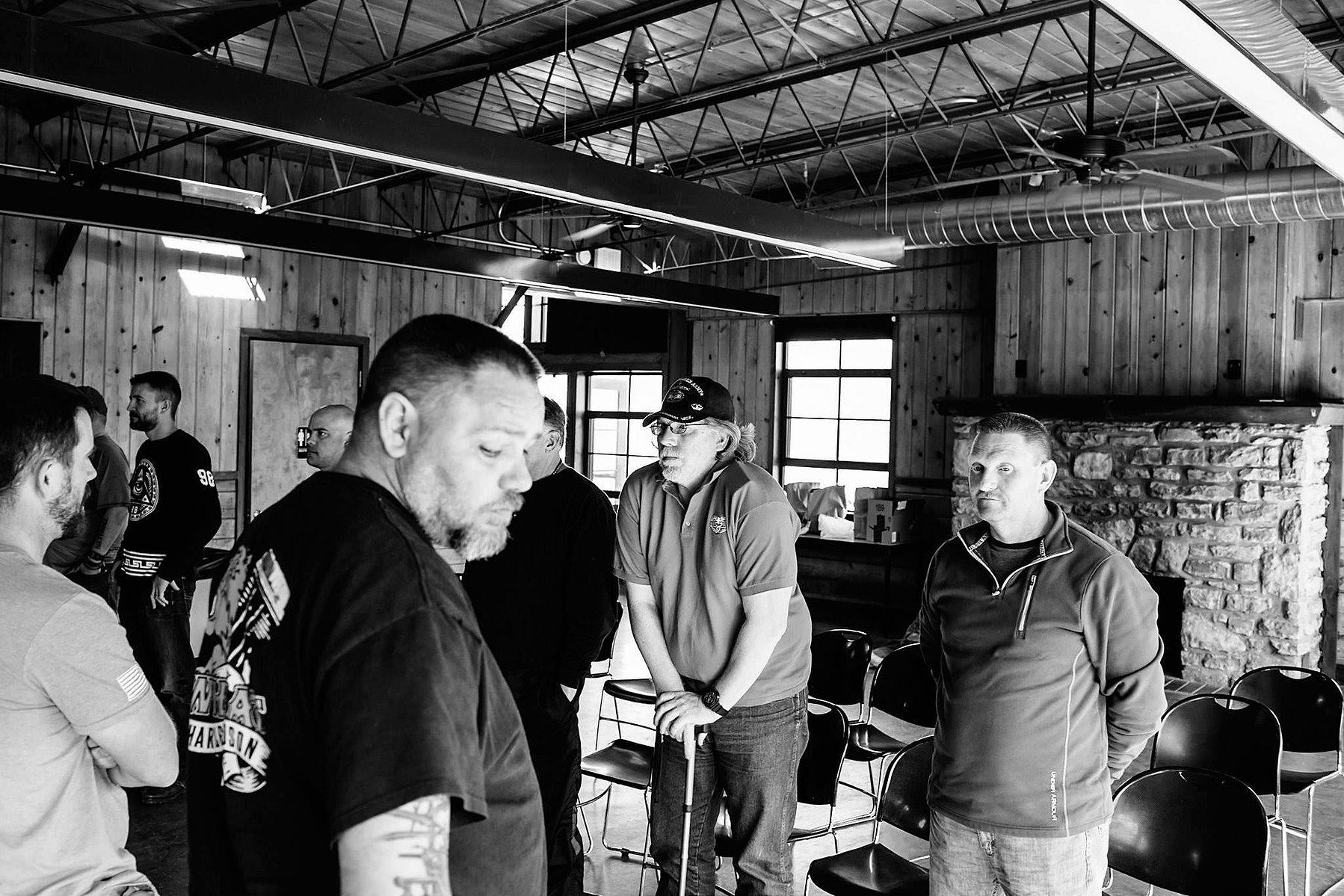 Participants line up across from each other, holding each other's gaze.