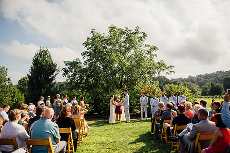 Wedding Ceremony in field unter tree at Quonquont Farm