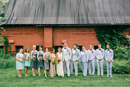Wedding party Photos at Quonquont Farm in front of red barn