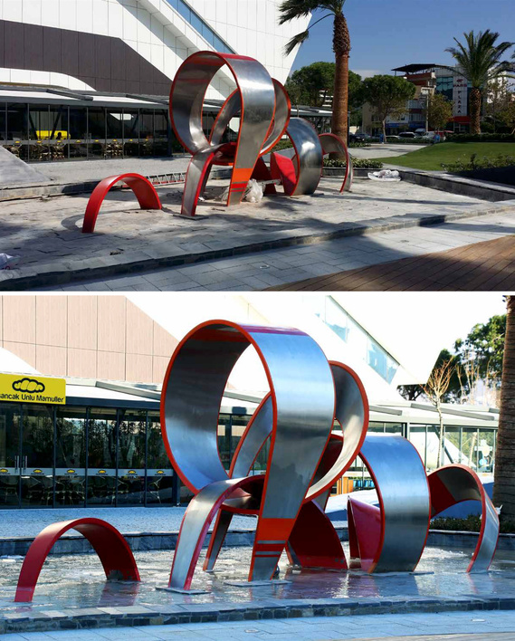 Grand Spin I. Stainless steel & acrylic sculpture. 4,5 x 10 m.