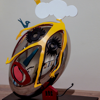 El Moukhtar. Painted metal and chrome. 25 x 32 x 25 cm. 2022.
