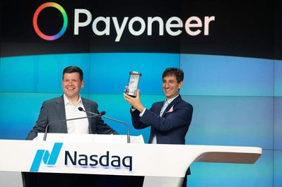 a company's CEO celebrating going public in NASDAQ