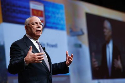 Former united states secretary of state Colin Powell gives a speech on stage at a company corporate event 