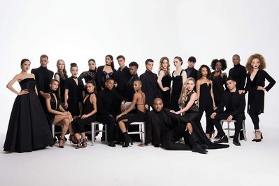 Studio group portrait of the Ailey School dancers wearing black