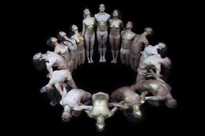 Cedar Lake Contemporary Ballet dancers in
Gold Body Paint making a circle