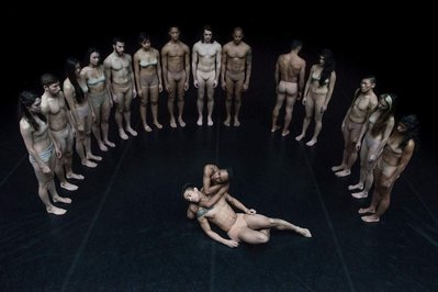 Cedar Lake Contemporary Ballet dancers standing in half circle and reenacting the pieta