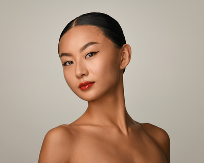 Headshot of a dancer on a white background at the Ailey School