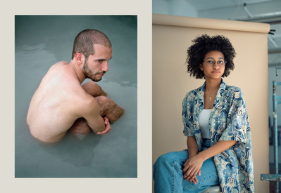 Dancer Tal Adler Arieli sitting in water and another artist
