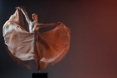 male dancer in a skirt at The Ailey School in long exposure