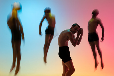 Male dancers of Pony Box Dance Theatre
jumping in long exposure and colored background