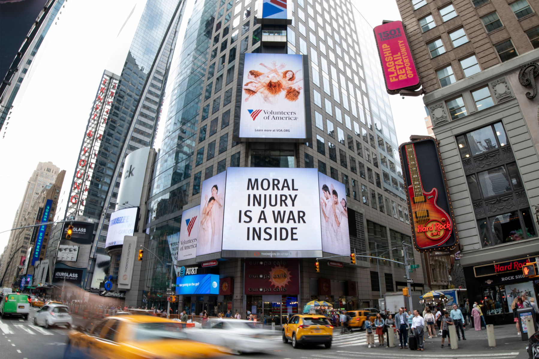 The Volunteers of America campaign photographed by Nir Arieli on Times Square's routers building, NYC during daytime