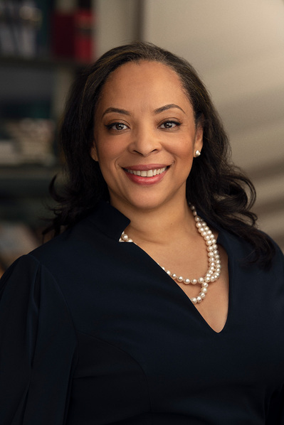 a corporate headshot in a natural environment background