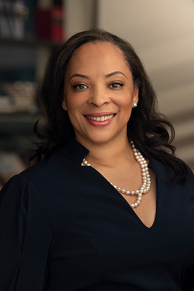 a corporate headshot in a natural environment background