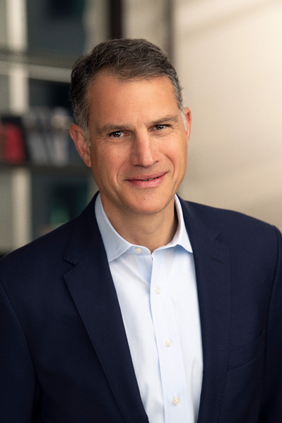 a corporate headshot in a natural environment background