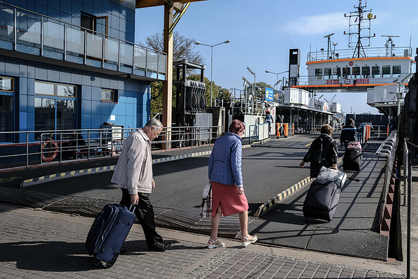 People embarking the local ferry in Świnoujście, Poland, on 26.09.2023.
