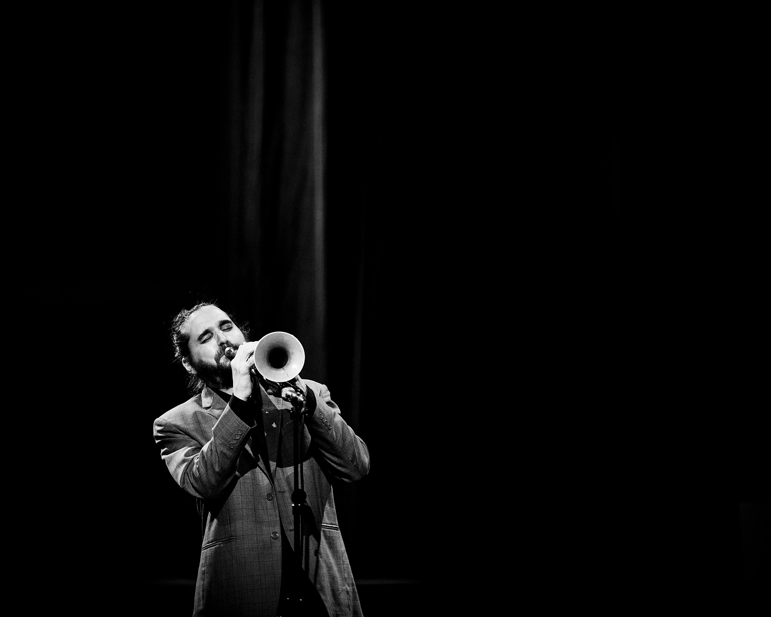 trumpeter solo on stage black and white picture