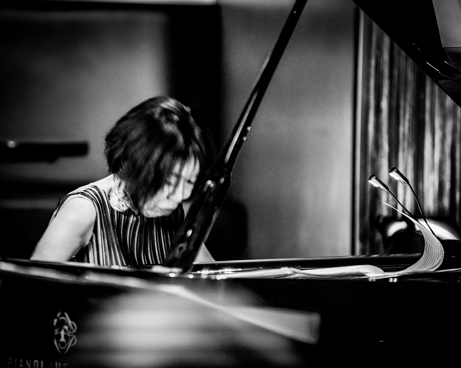 piano player with grand piano