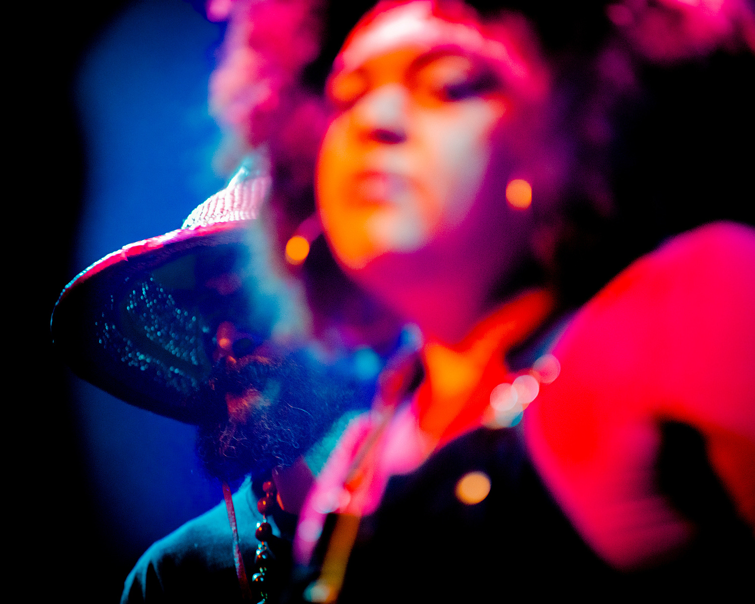 singer on stage in red light