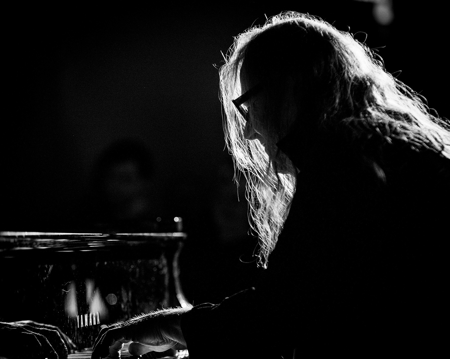 piano player in backlit