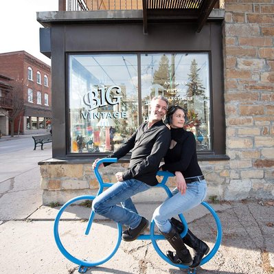 Engagement photograph of couple on bicycle in Almonte by Smiths Falls photographer Frank Fenn