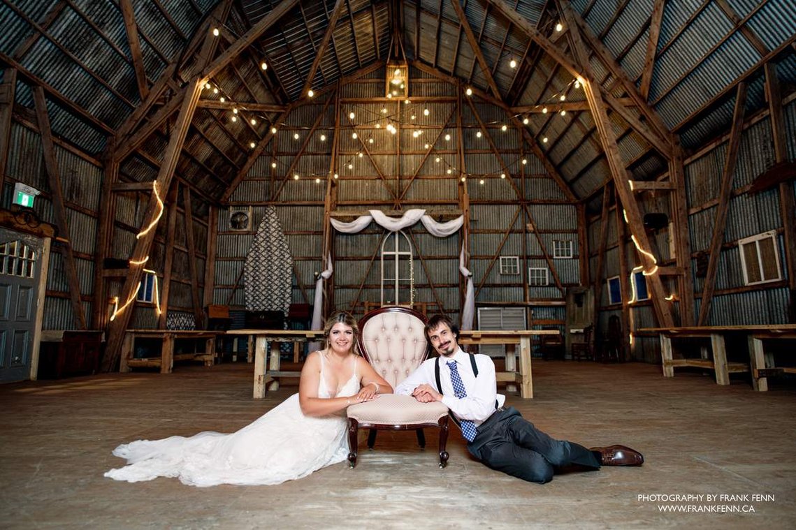 Bride and Groom Wedding portrait in barn by Frank Fenn, serving Ottawa and Eastern Ontario