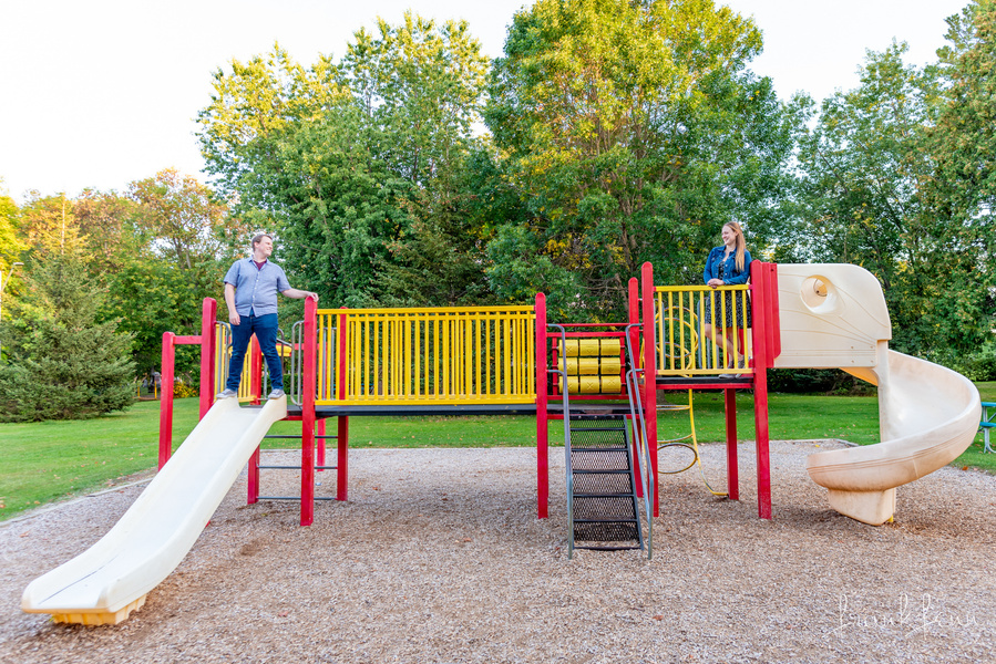 Engagement picture in playground by Ottawa Photographer Frank Fenn