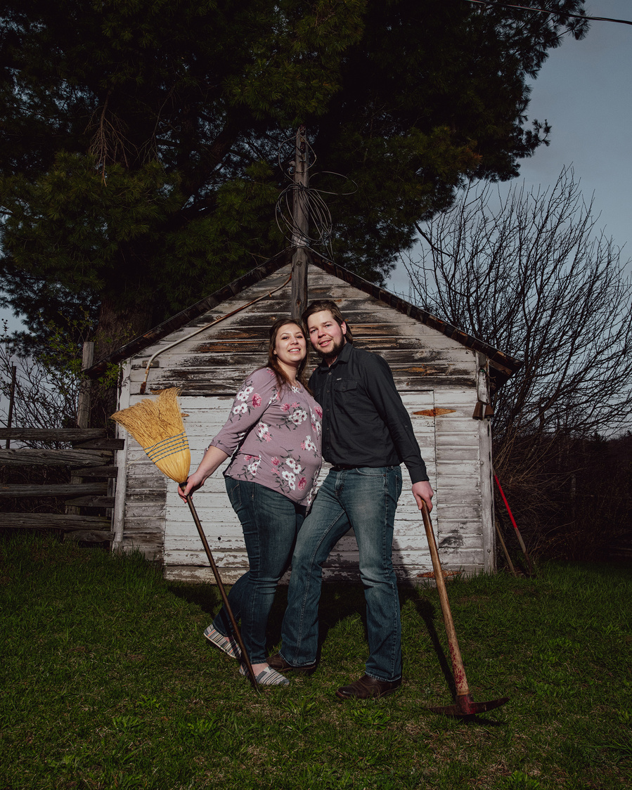 Engagement picture in farm field by Ottawa Photographer Frank Fenn