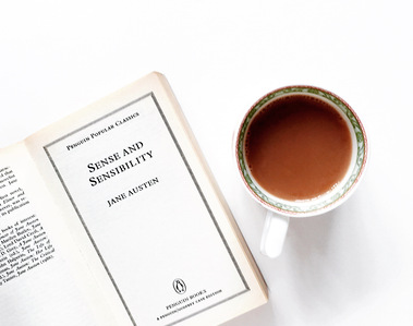 Sense and Sensibility by Jane Austen with a cup of tea