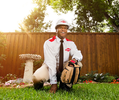 Orkin Man Kneeling in Advertising Campaign Shot by Ashton Staniszewski