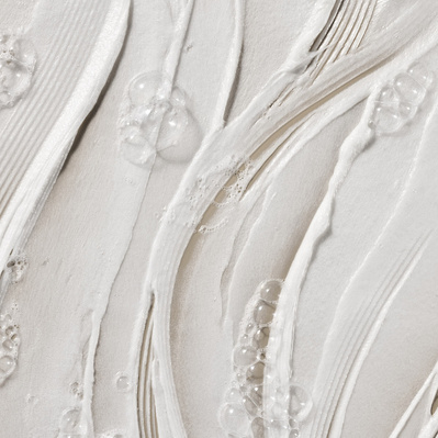 A macro shot capturing Deinde skincare’s hydrating formula, enhanced with delicate bubbles and organic swirls. Photographed by Los Angeles product photographer Alex Kapustin at Rig Studio LA.