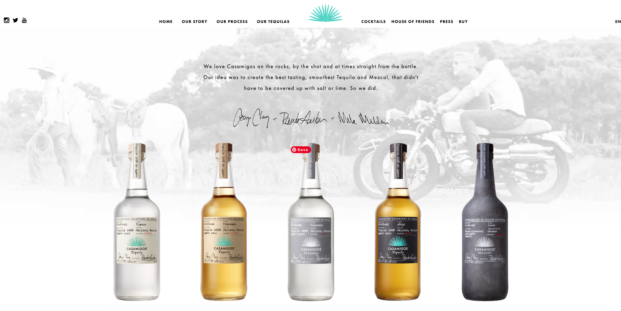 A lineup of Casamigos Tequila and Mezcal bottles displayed against a rustic, vintage-inspired background with a faded image of cowboys and motorcycles. The image conveys the brand’s smooth and high-quality tequila meant to be enjoyed neat.