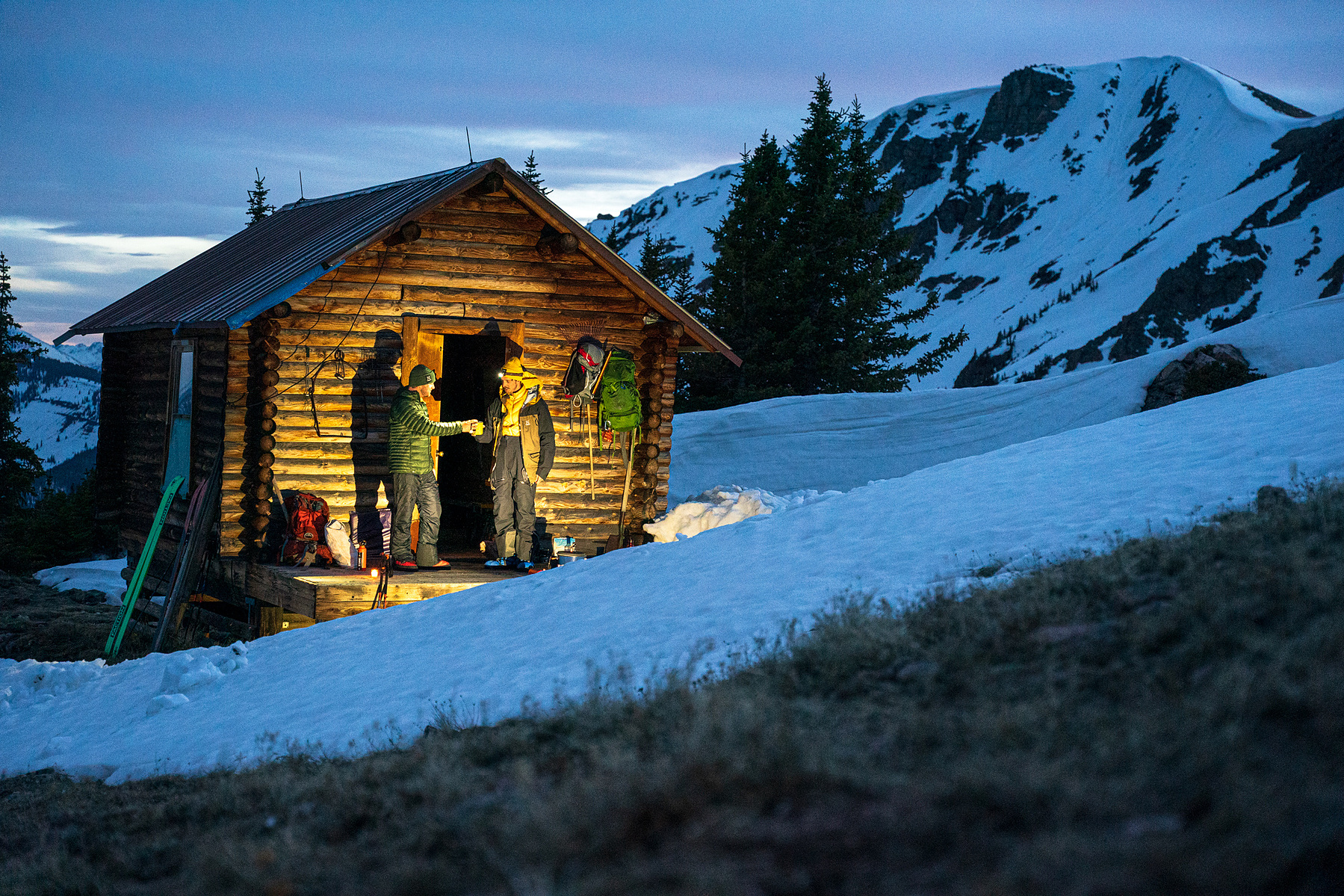 Two men at backcountry alpine hut in Colorado