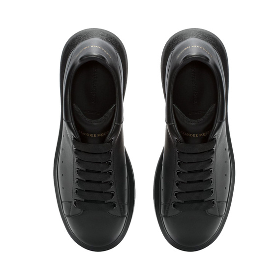 Alexander McQueen triple black calf luxury leather sneakers by Ryan Lovering