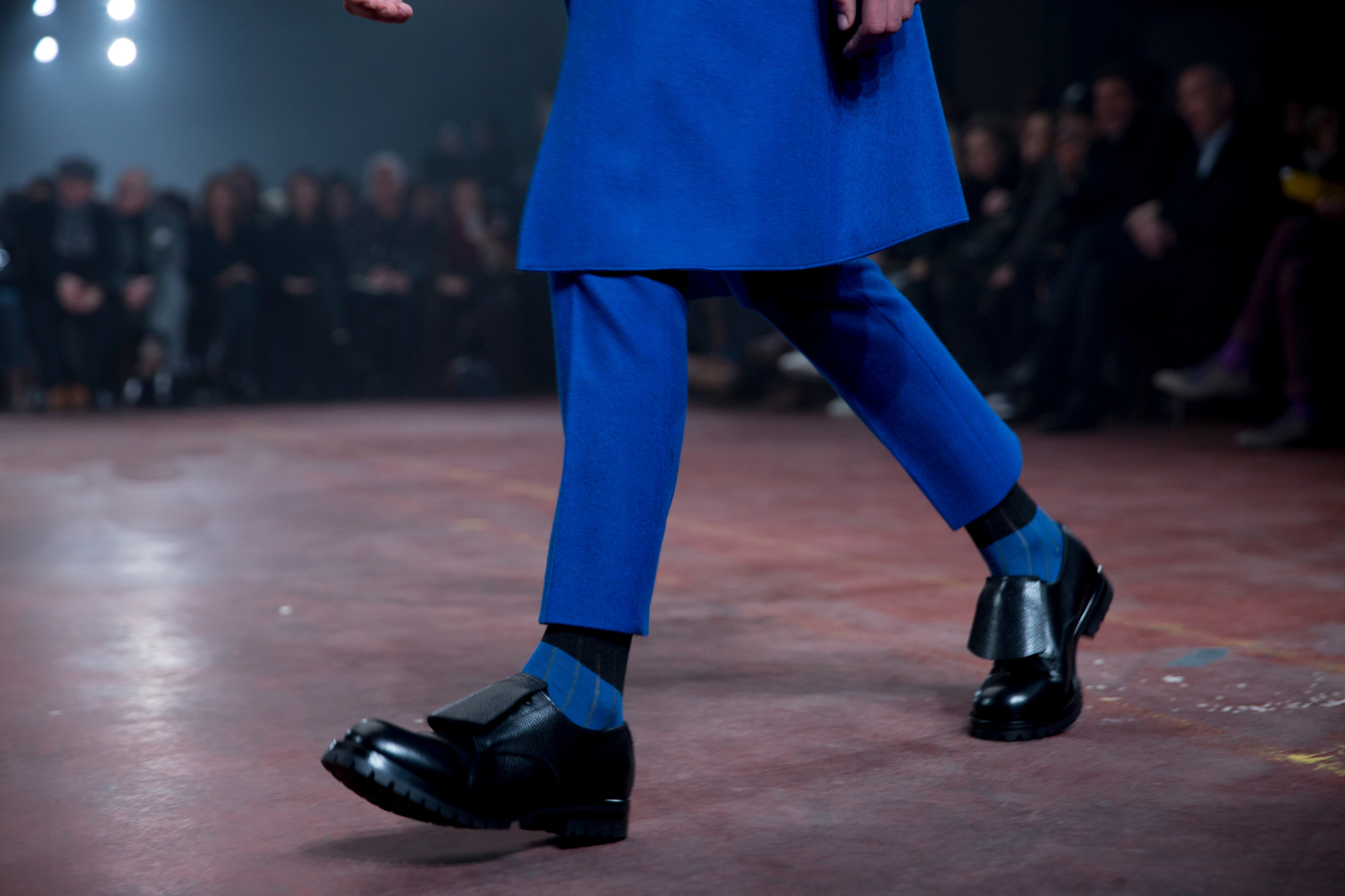 Model wearing chunky commando shoes by Ryan Lovering for Alexander McQueen mens runway Winter 2015