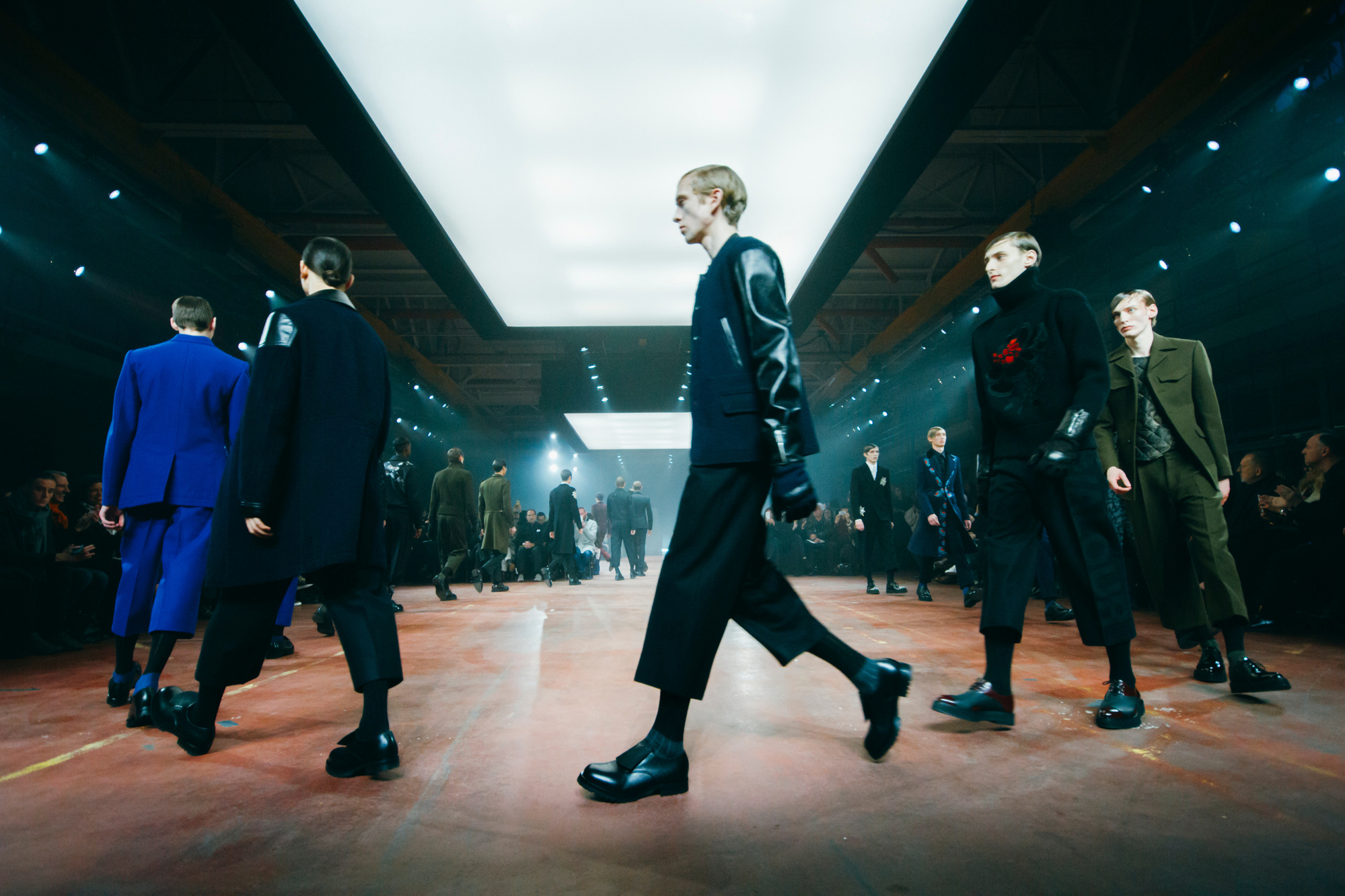 Model wearing chunky shoes by Ryan Lovering for Alexander McQueen mens runway finale Winter 2015