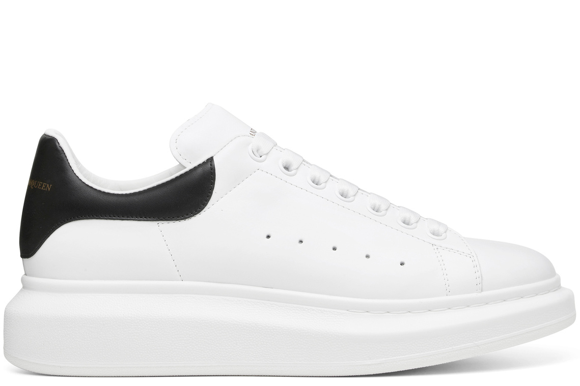 Alexander McQueen oversized sneaker in white leather with black leather heel tab