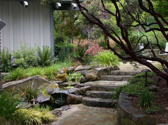 Waterfall and stone steps and walls