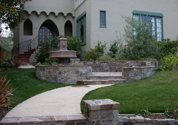 Stone patio and walls with Mediterranean fountain