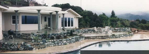 Stamped concrete patios and stone terraces