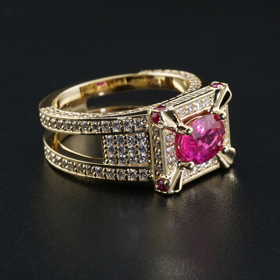 This stunning 1.84ct natural ruby ring in yellow gold features 162 round brilliant cut diamonds (I quality, VS/SI clarity, E-F colour). The vibrant ruby contrasts beautifully with the diamonds, creating an elegant piece perfect for special occasions.