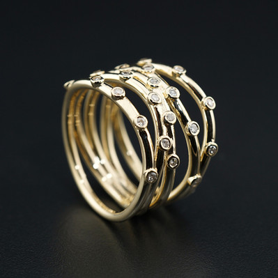 Make a bold statement with a Layered Yellow Gold Scattered Diamond Wide Ring. Featuring dazzling diamonds in a unique scattered design, this ring combines modern style with allure.