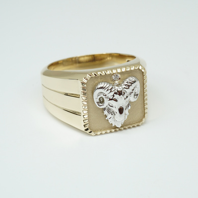 Celebrate your zodiac with a Yellow Gold Signet Ring featuring a White Gold Aries symbol and April's birthstone, the diamond. A personalized and meaningful piece that blends astrology with style.