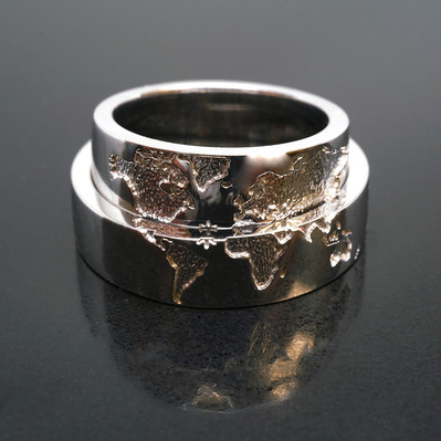 Celebrate your bond with White Gold Matching Couple World Map Bands. Designed with intricate world map details, these rings symbolize your shared journey and everlasting bond.