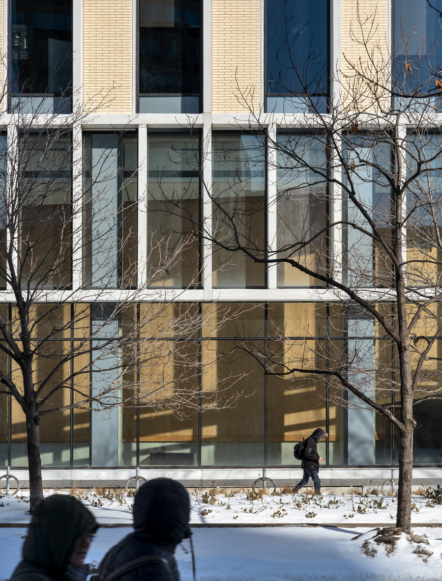 University of Toronto Myhal Centre. Architect: Montgomery Sisam Architects. Taken by Adrian Ozimek Toronto, Vancouver, Nova Scotia architectural and interiors photographer.  Exterior facade in snow, Toronto