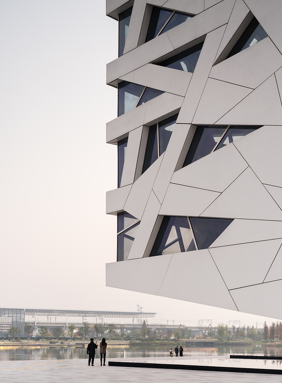 Henning Larson Hanzhou Opera House architectural design in China. Adrian Ozimek architectural photographer captures this project in it's urban context. Canadian architecture and interior photographer