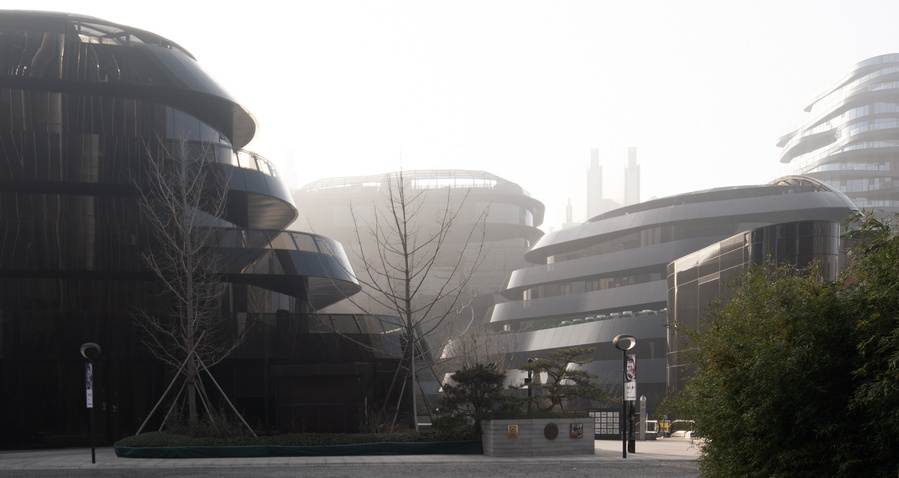 MAD Architects Beijing China Chaoyang Park Plaza. Canadian architectural photographer Adrian Ozimek photographs the exterior of this project at sunrise.Inspired by traditional Chinese landscape paintings