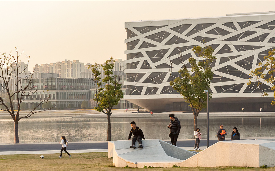 Henning Larson Hanzhou Opera House architectural design in China. Adrian Ozimek architectural photographer captures this project in it's urban context. Canadian architecture and interior photographer