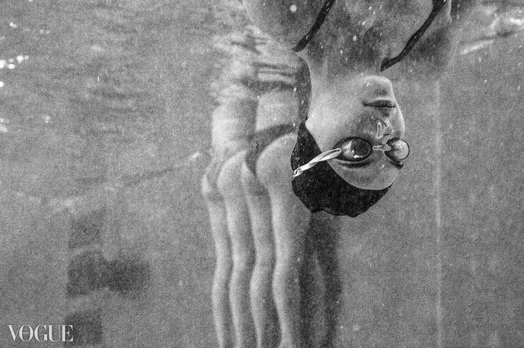 Underwater photography. Portrait of woman underwater 